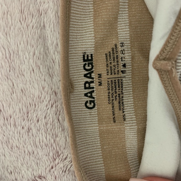 brown and white tank from garage - Picture 2 of 3